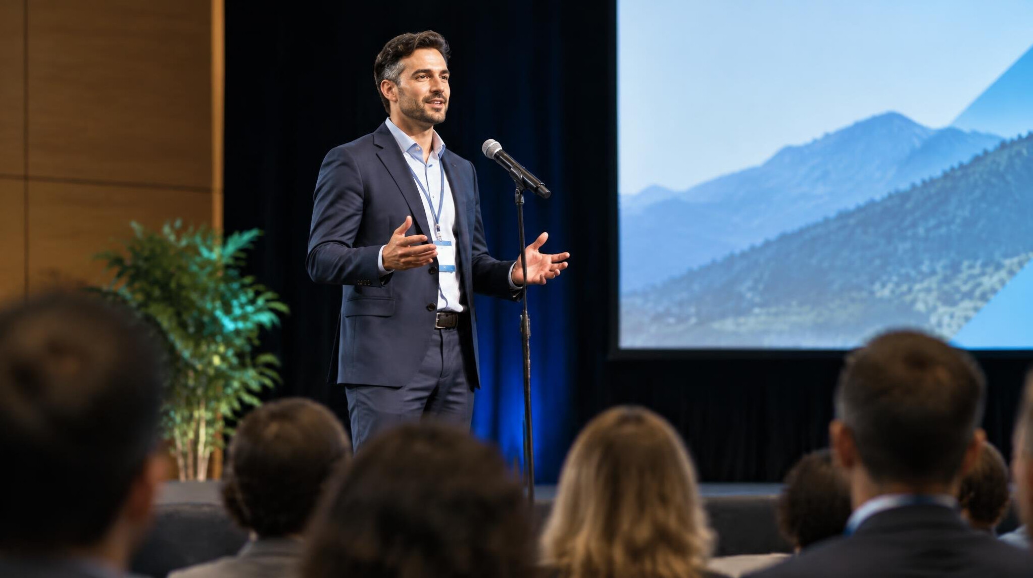 confident speaker on stage