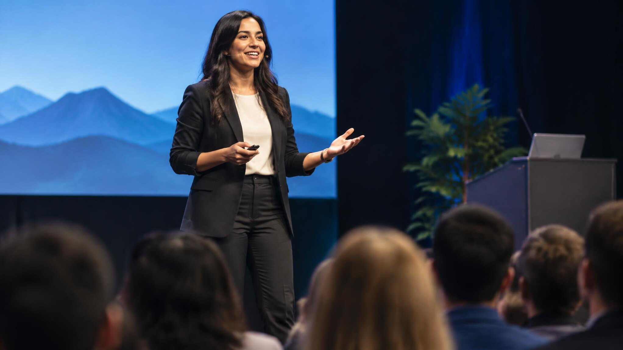 confident speaker on stage