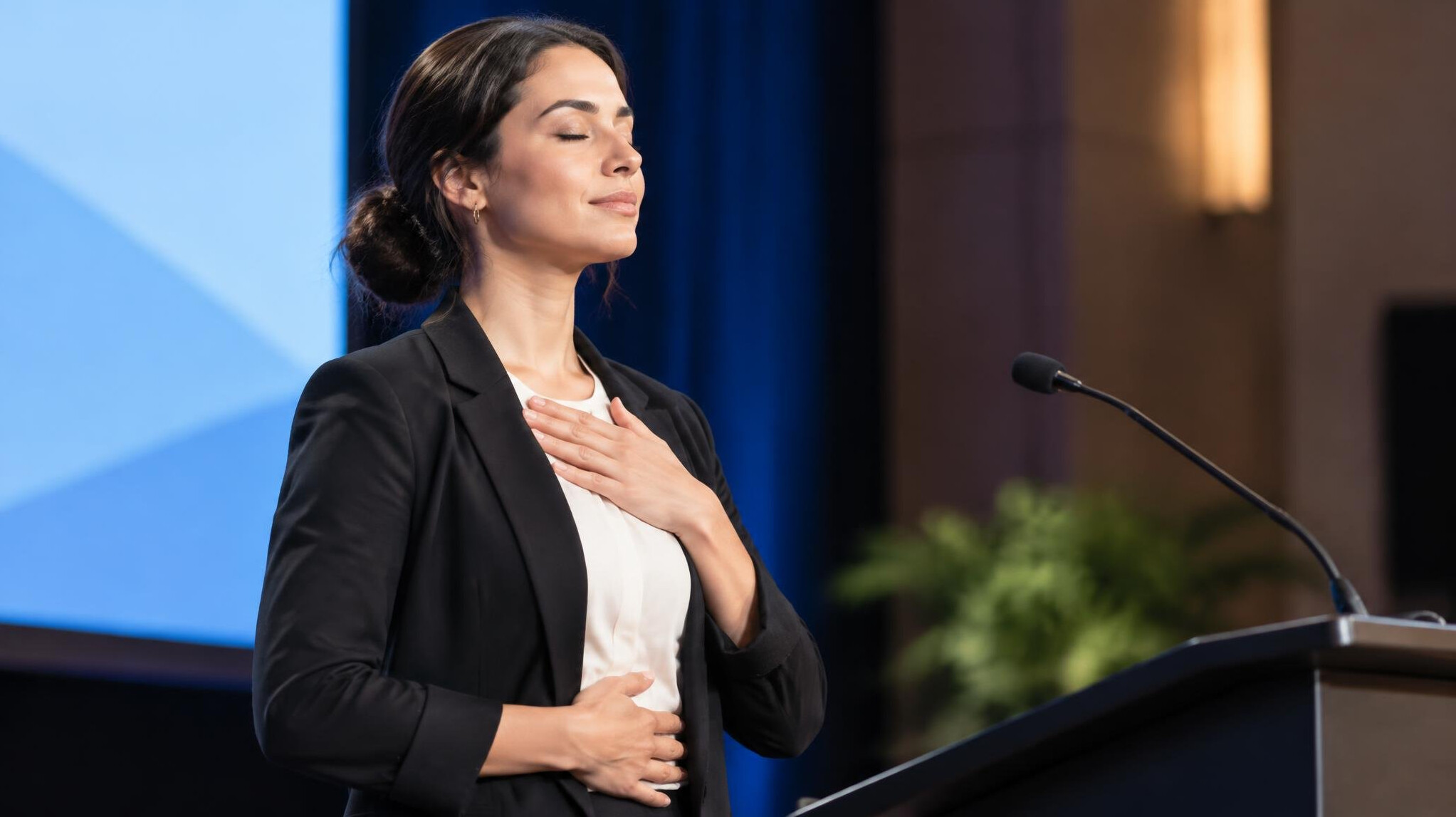 woman breathing exercise before speech